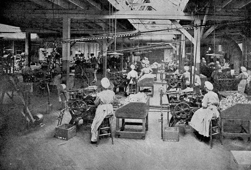 Women working in piecework factory in 1909.