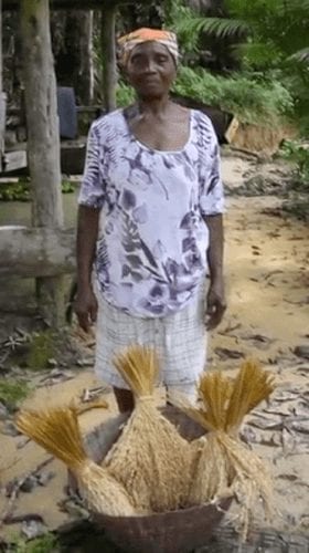 French Guiana farmer displays her harvest.