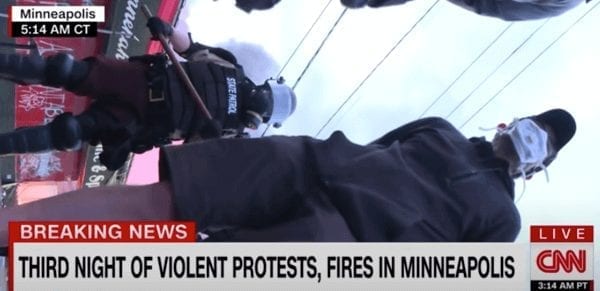 Live video taken from the ground as CNN reporters are arrested by Minneapolis police.