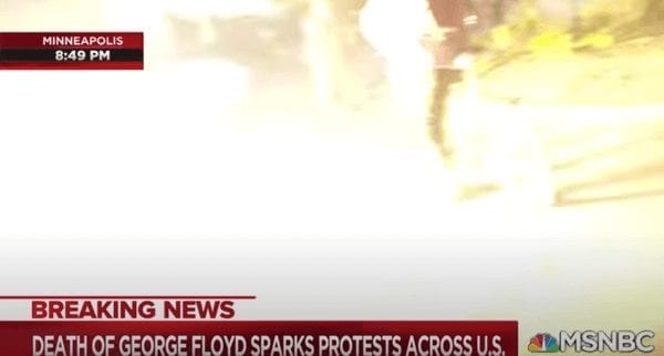Flashbangs go off near protesters and journalists as they run from MN police.