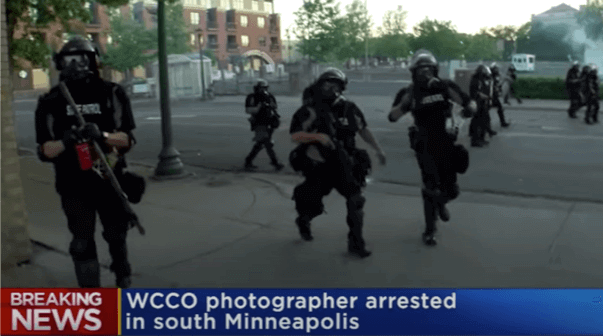 WCCO journalist Tom Aviles takes video as Minn police turn to arrest him during Floyd protests.