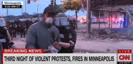 Journalist Omar Jimenez with CNN is arrested by Minneapolis police.