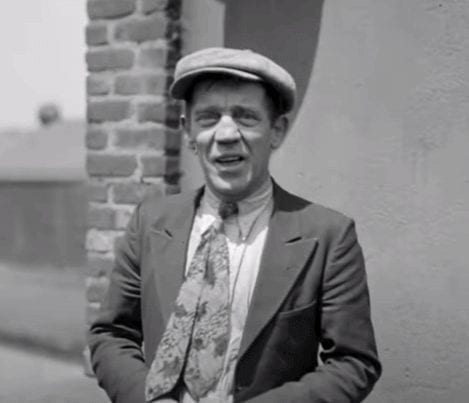 Alvin Shipwreck Kelly wearing a hat and tie.
