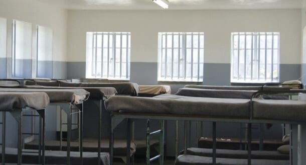 Rows of bunk beds in a U.S. migrant detention facility.