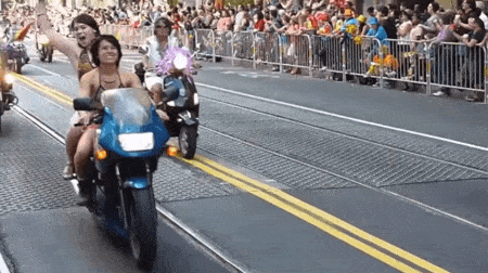 Gif of Dykes on Bikes riding in 