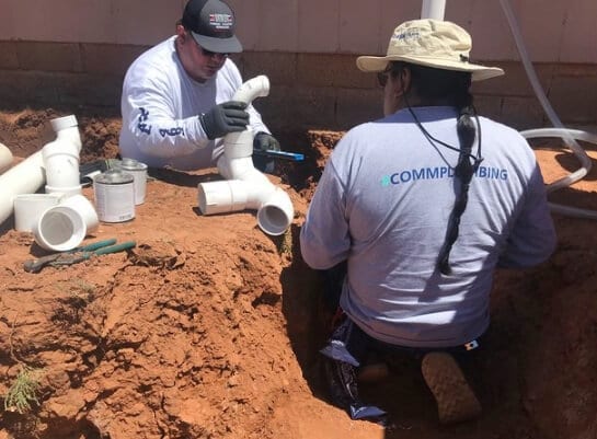 Relief group installs running water in Navajo home. 