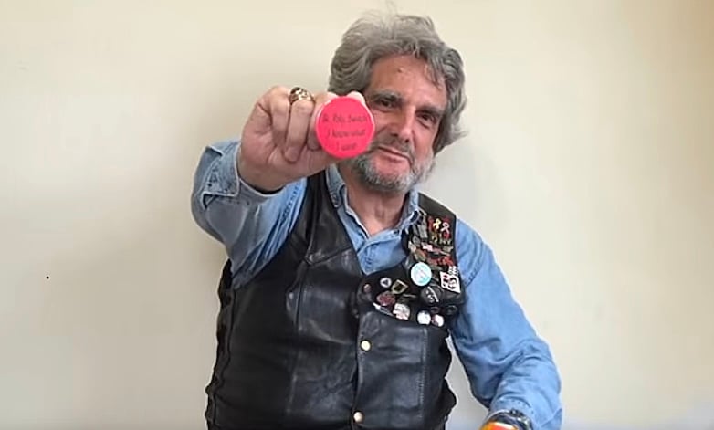 Larry Nelson holding Bi, Poly, Switch button