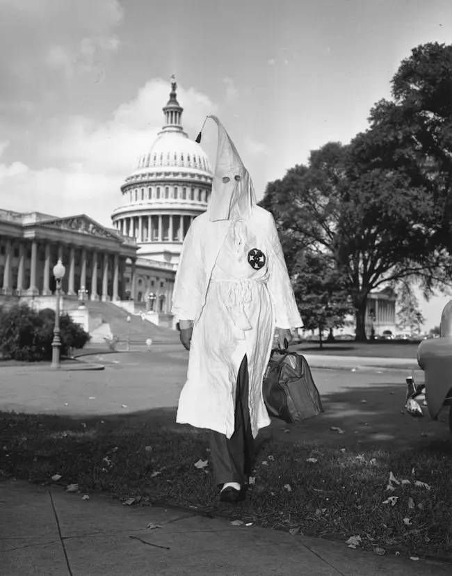 Kennedy leaves the Capitol in KKK robes in 1947